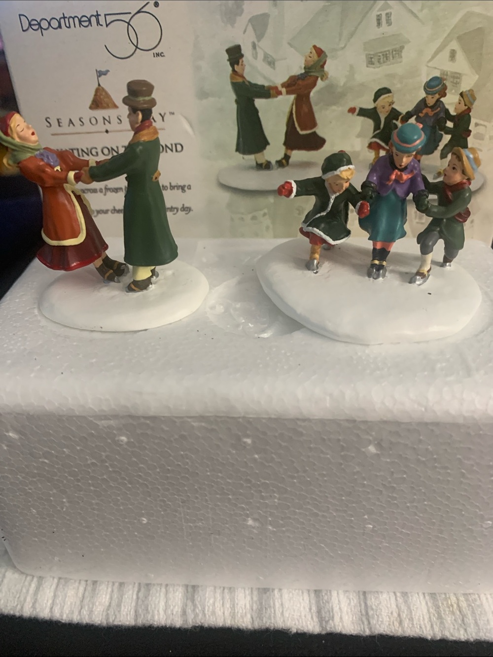 Department 56, Seasons Bay Collection. Skating on the pond. Set of two